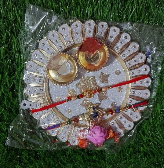 Picture of Roli Chawal Round Thali with 2 Rakhi - Big